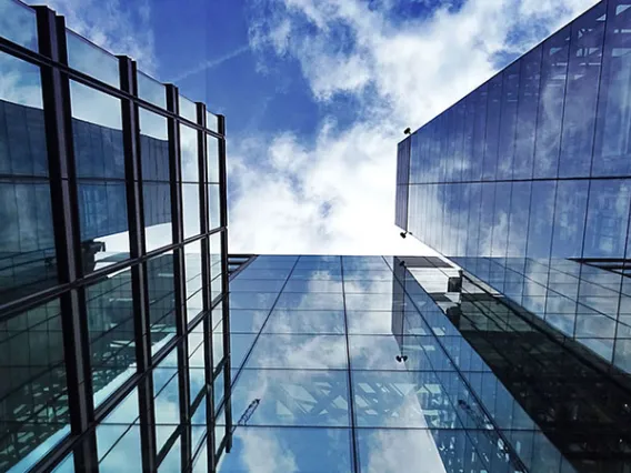 sky reflecting in buildings