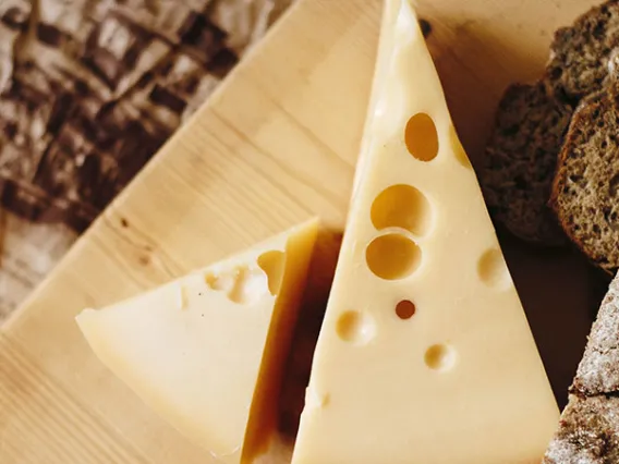 cheese on a wooden board