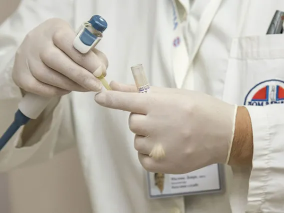 doctor holding medical instruments