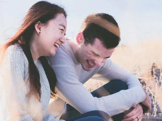 people sitting and laughing