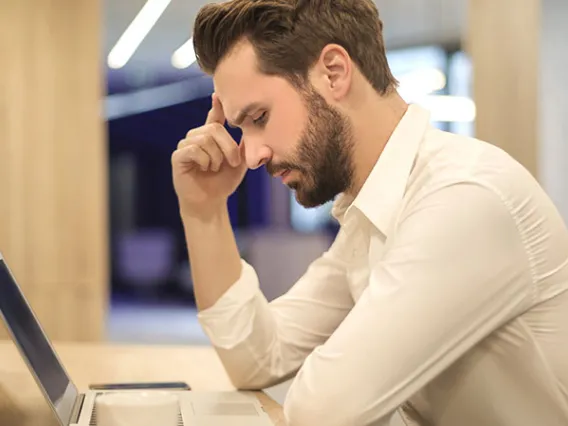 confused man with computer