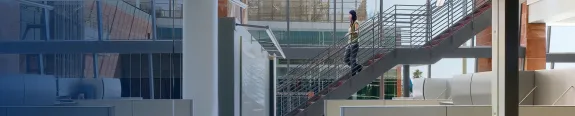 woman walking down stairs