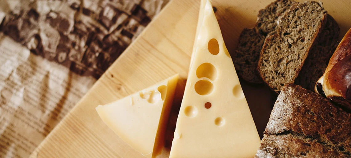 cheese on a wooden board