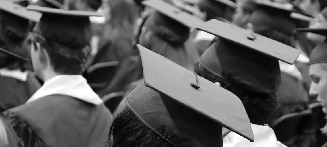 people in graduation caps