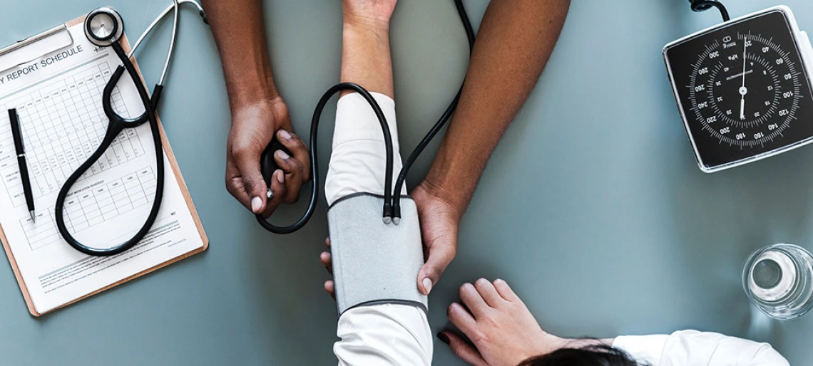 person having blood pressure taken