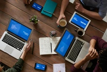 Computers at a table