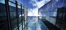 sky reflecting in buildings